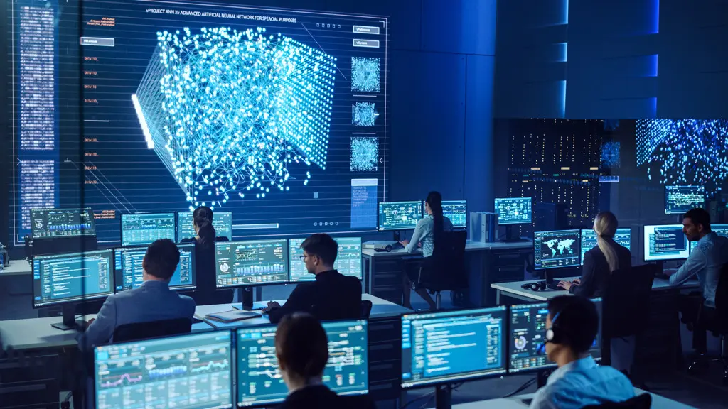 large room with multiple workstations and operators working together, as well as independently, creating control room distractions
