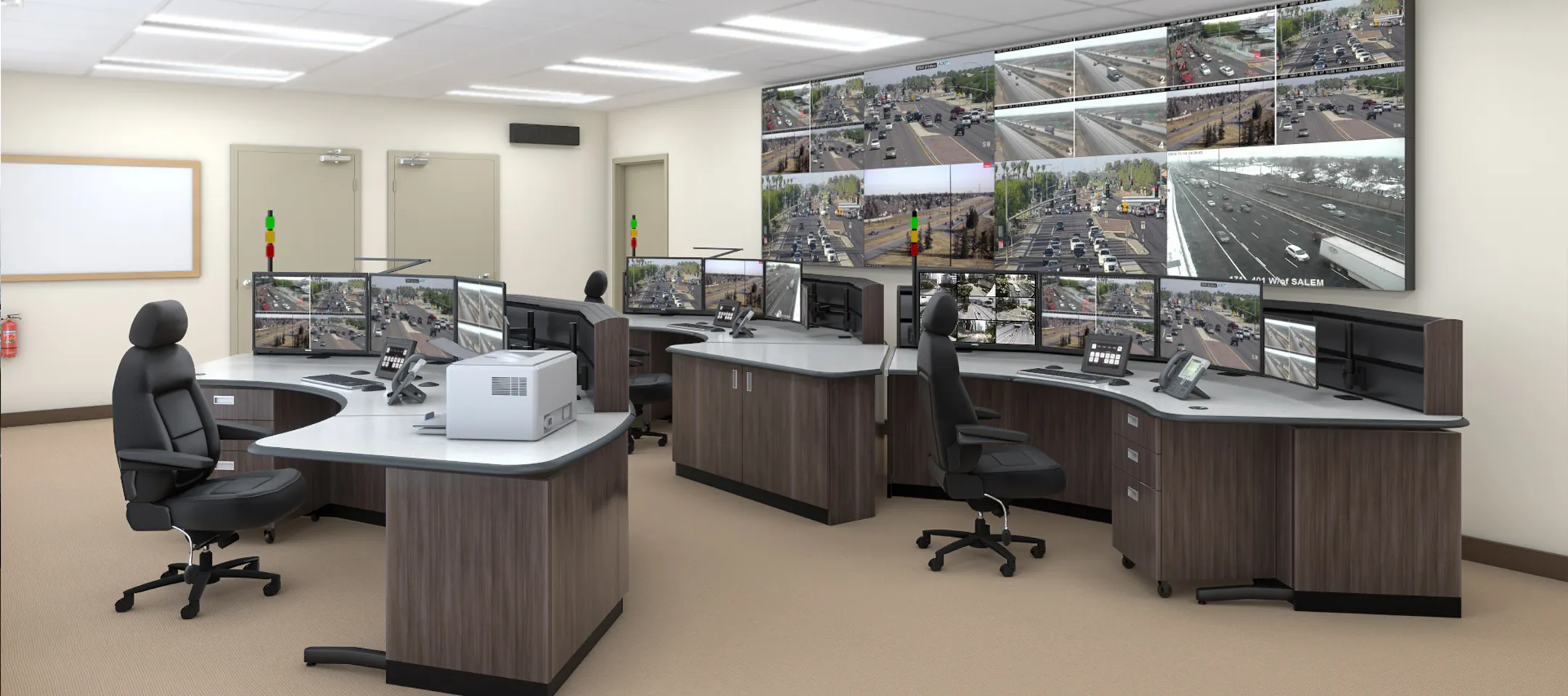 Tresco traffic control room with three workstations and a large video wall