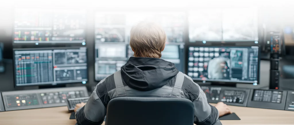 an operator researching for the future of control room consoles in his multi monitor workstation