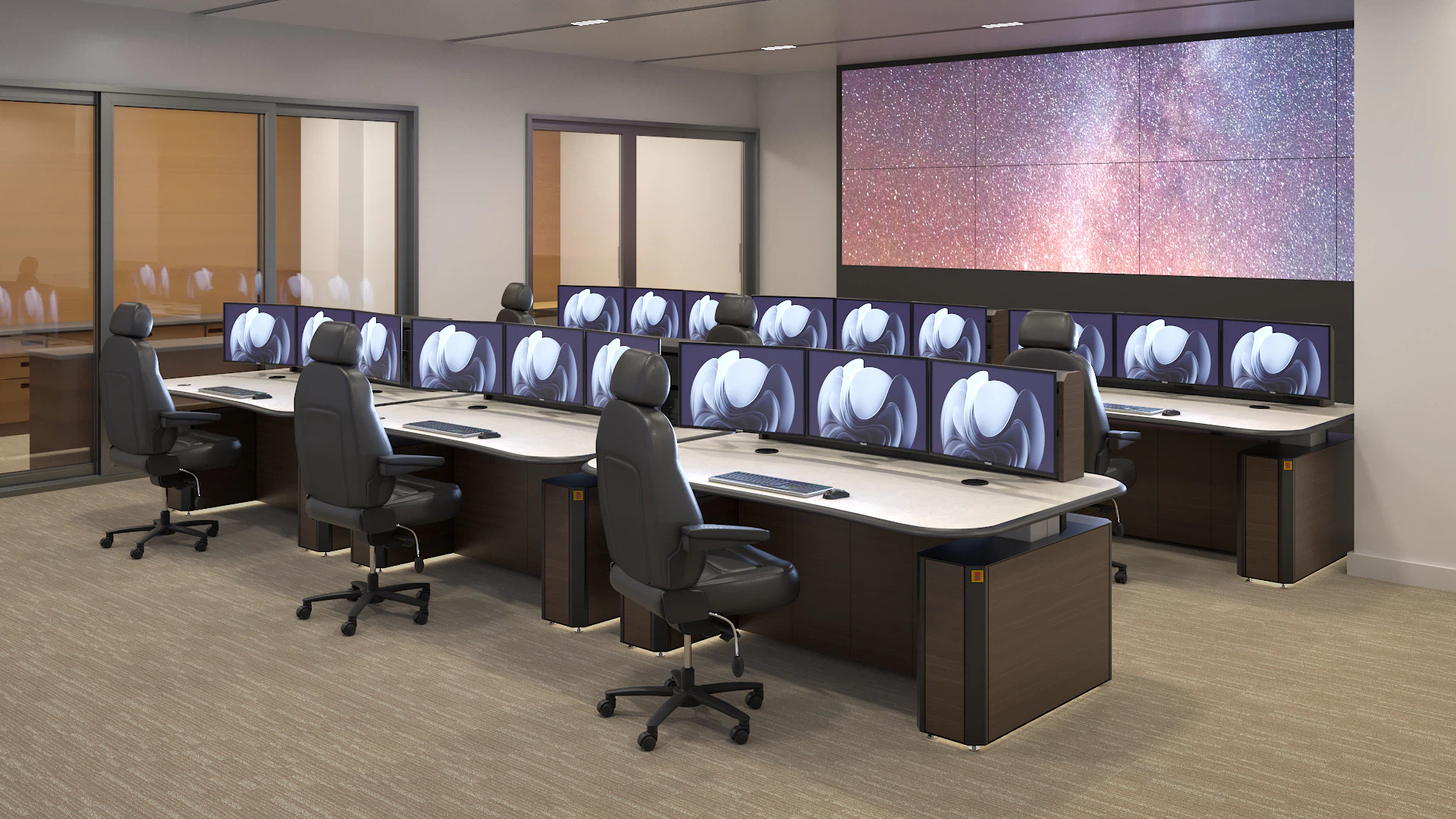 AEGIS modular control room furniture in an emergency dispatch center featuring curved worksurfaces and LED task lighting